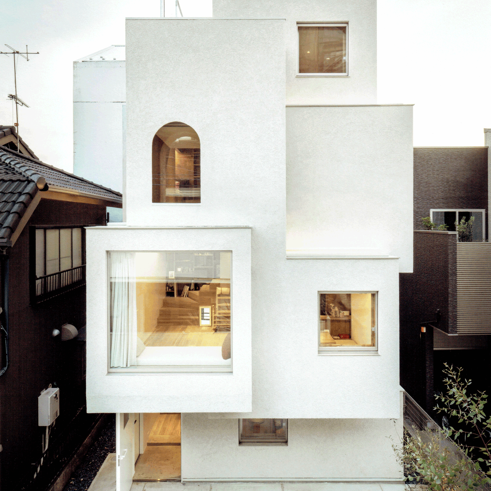 Japanese houses | Dezeen - Tokyo home comprises cluster of protruding white boxes