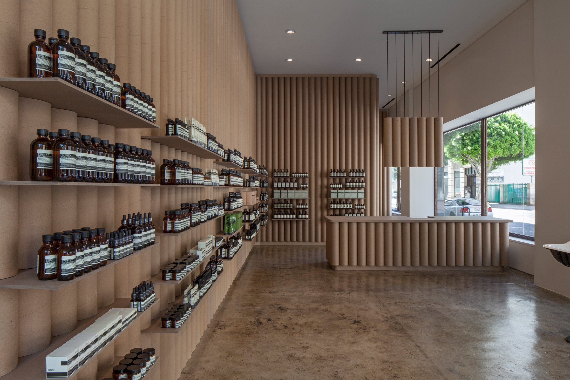 Brooks + Scarpa recycles cardboard tubes and paper for Los Angeles Aesop store interior