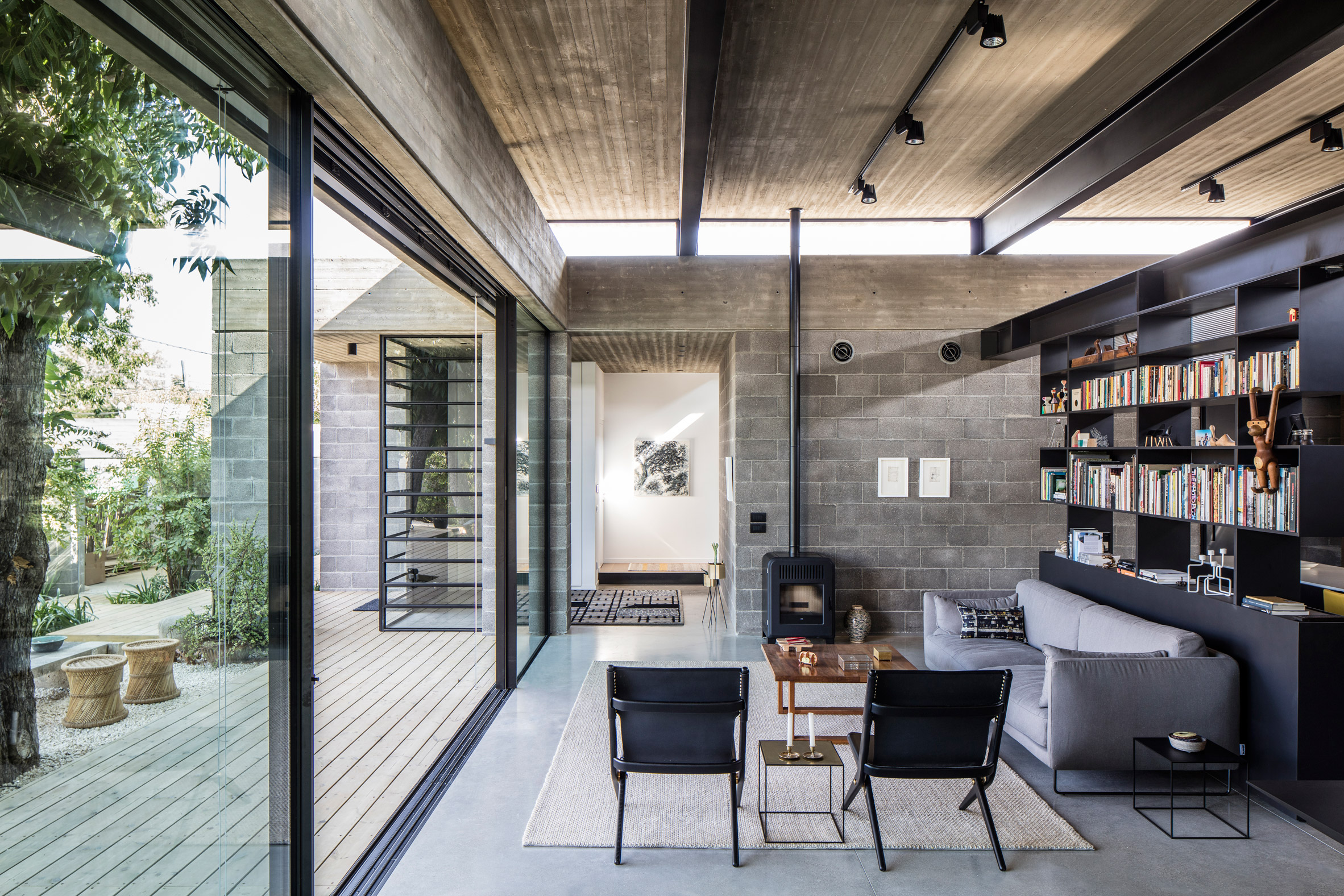 Living room with concrete walls and ceiling