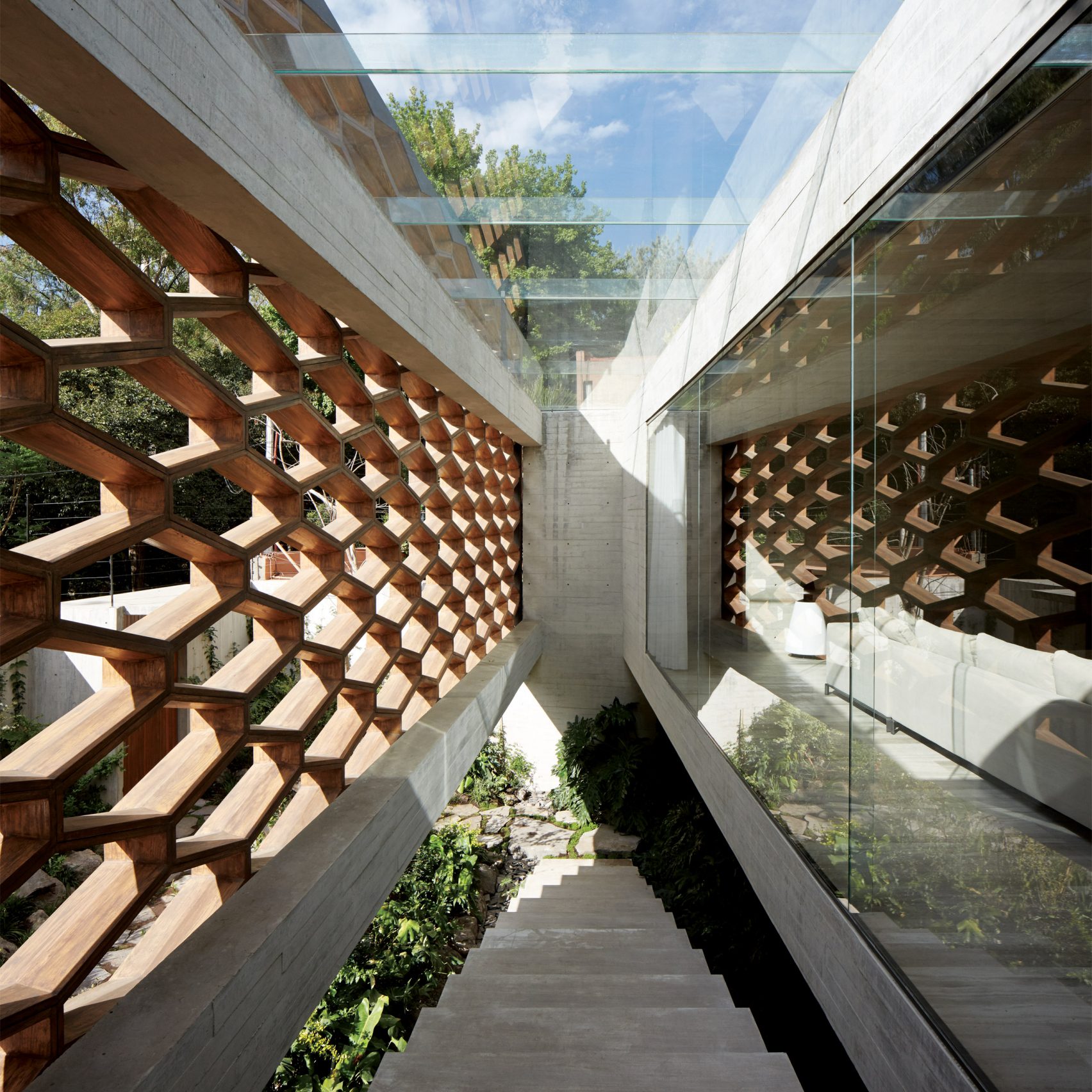 Andres Stebelski Elevates Boxy Clay Covered House Above Parking Spot In Mexico 2383