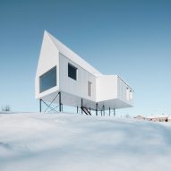 Delordinaire raises High House above snowy Quebec countryside to protect an outdoor lounge