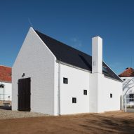 ADR places small white fruit distillery among 19th-century farm buildings in Bohemia
