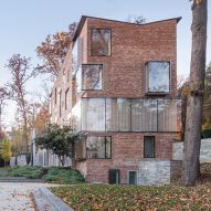 NADAAA overhauls brick house in Washington DC with ample glazing and a plywood interior