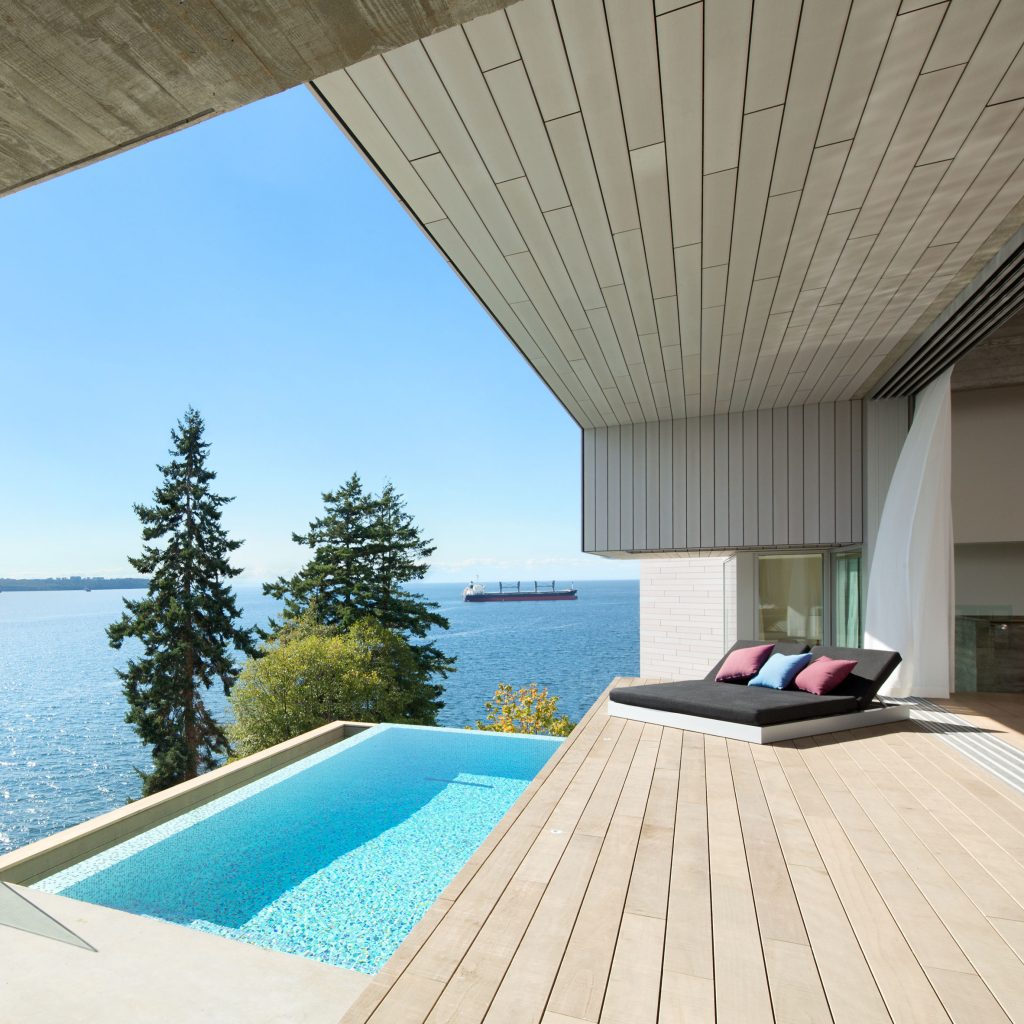 Mcleod Bovell Modern Houses nestles West Vancouver home into rocky hillside