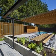 Wooden pool house by Amantea Architects provides privacy for Canadian family