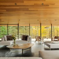 Abundant glazing and wrap-around terraces feature in Vermont home by J Roc Design