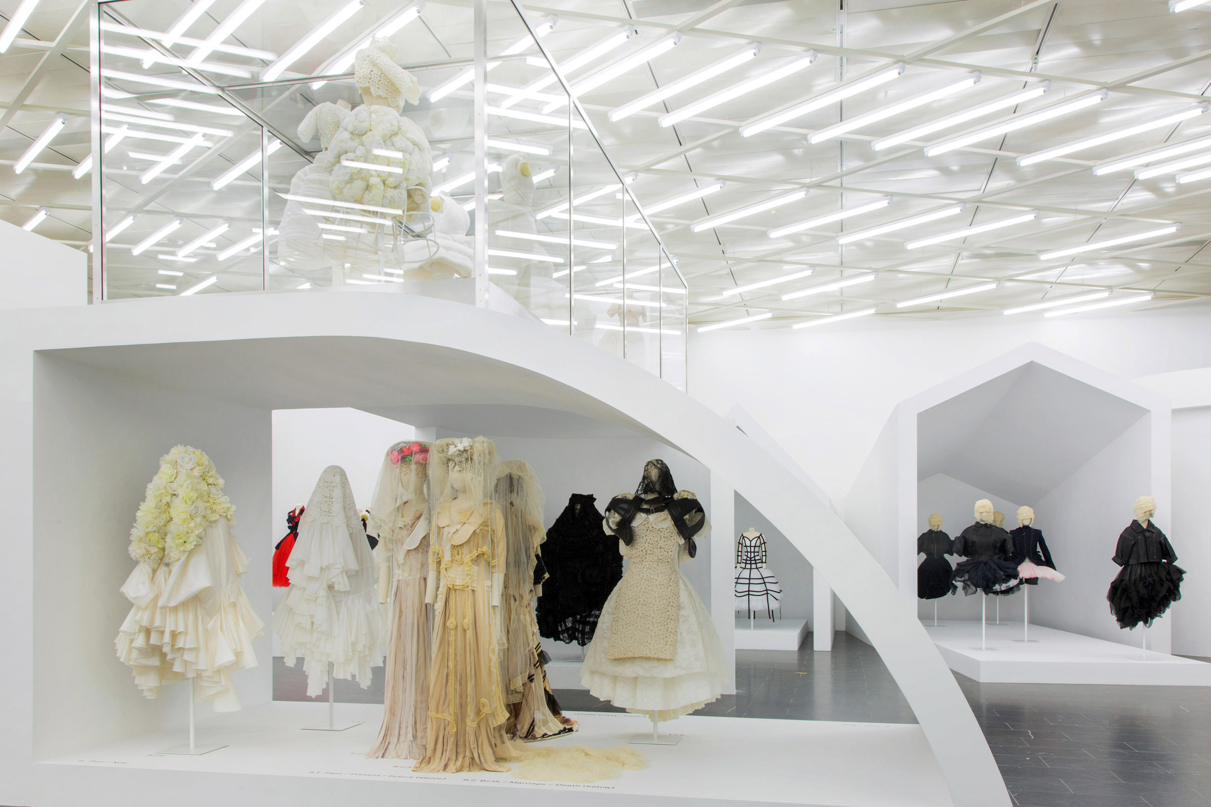Comme des Garçons fashion exhibition at The Met in New York; Gallery View, Then/Now