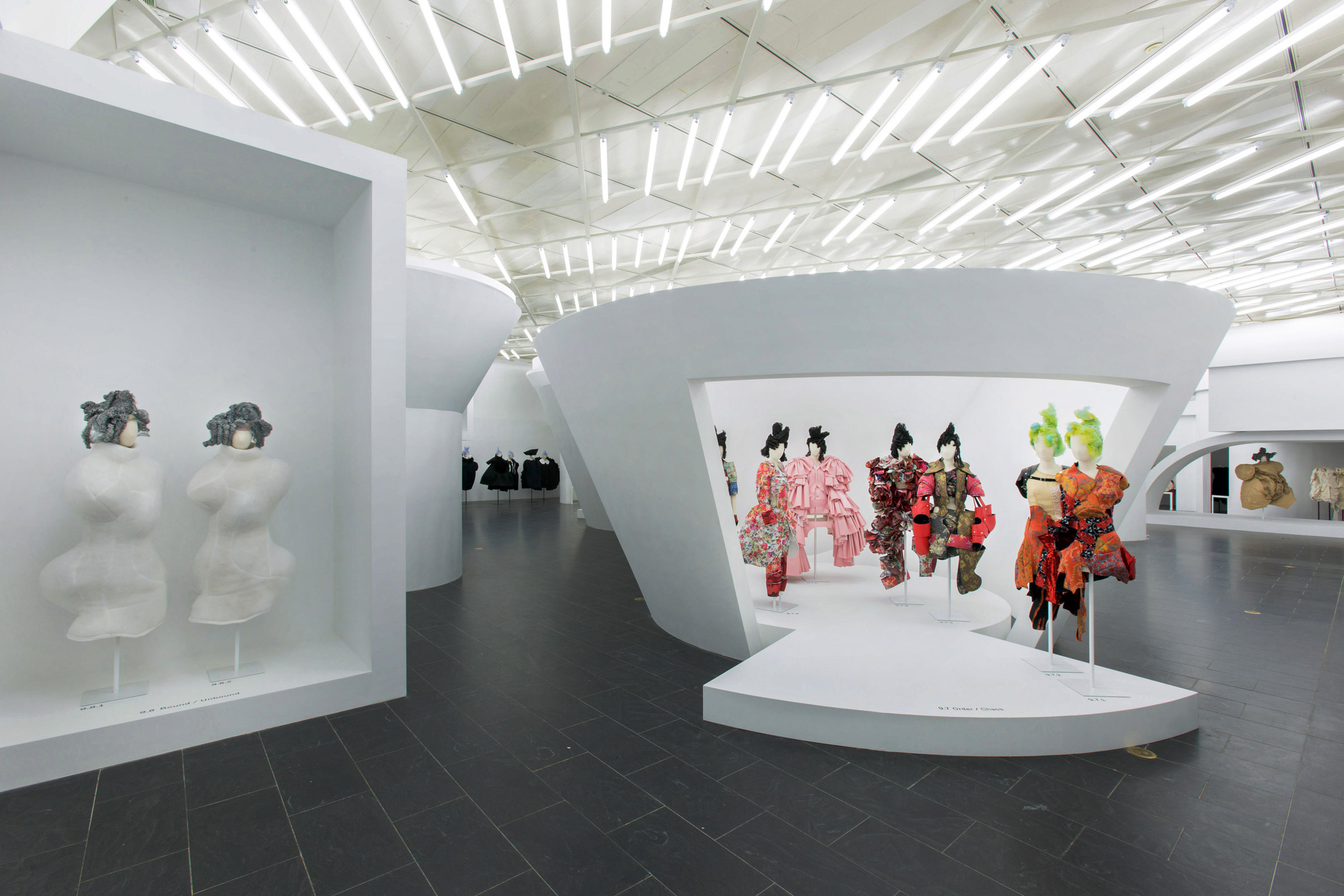 Comme des Garçons fashion exhibition at The Met in New York; Gallery View, (from left) Bound/Unbound, Order/Chaos