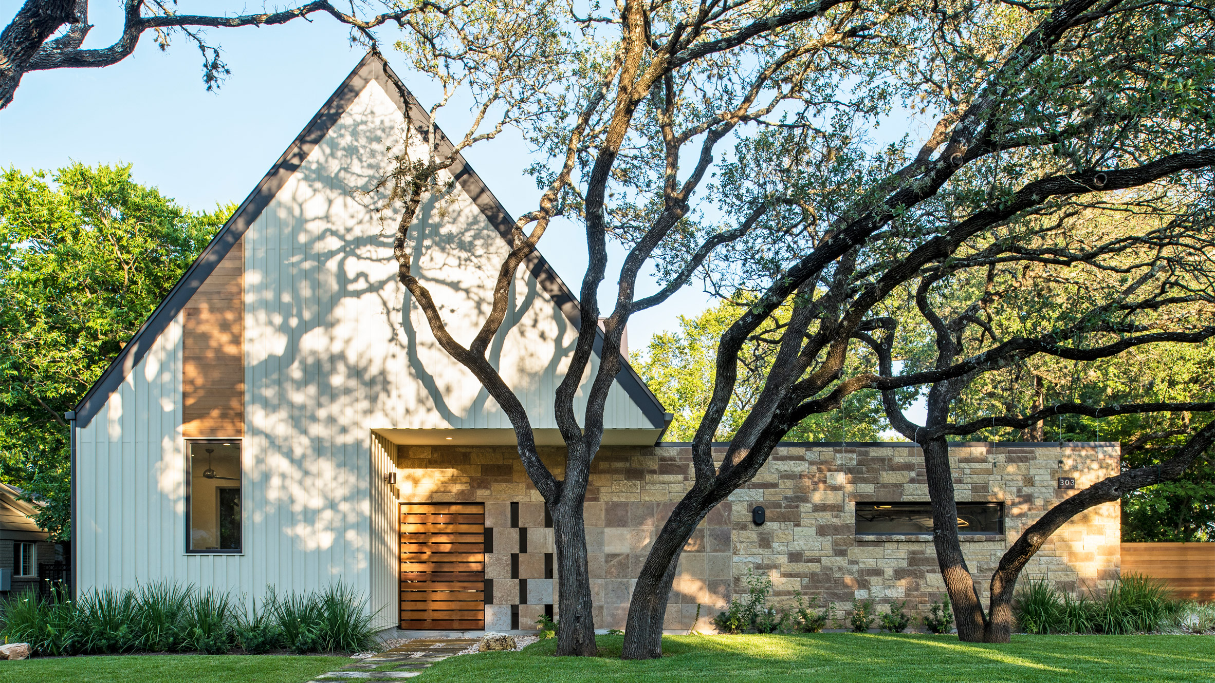 Gable wall conceals double-height atrium in Austin home by Design ...  Gable wall conceals double-height atrium in Austin home by Design Hound