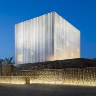 Neri&Hu's Suzhou Chapel combines textured brick base with ethereal white cube