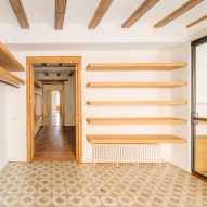 Nook Architects uncovers original tiles and timber beams inside Barcelona flat