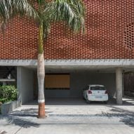 Brick Curtain House by Design Work Group