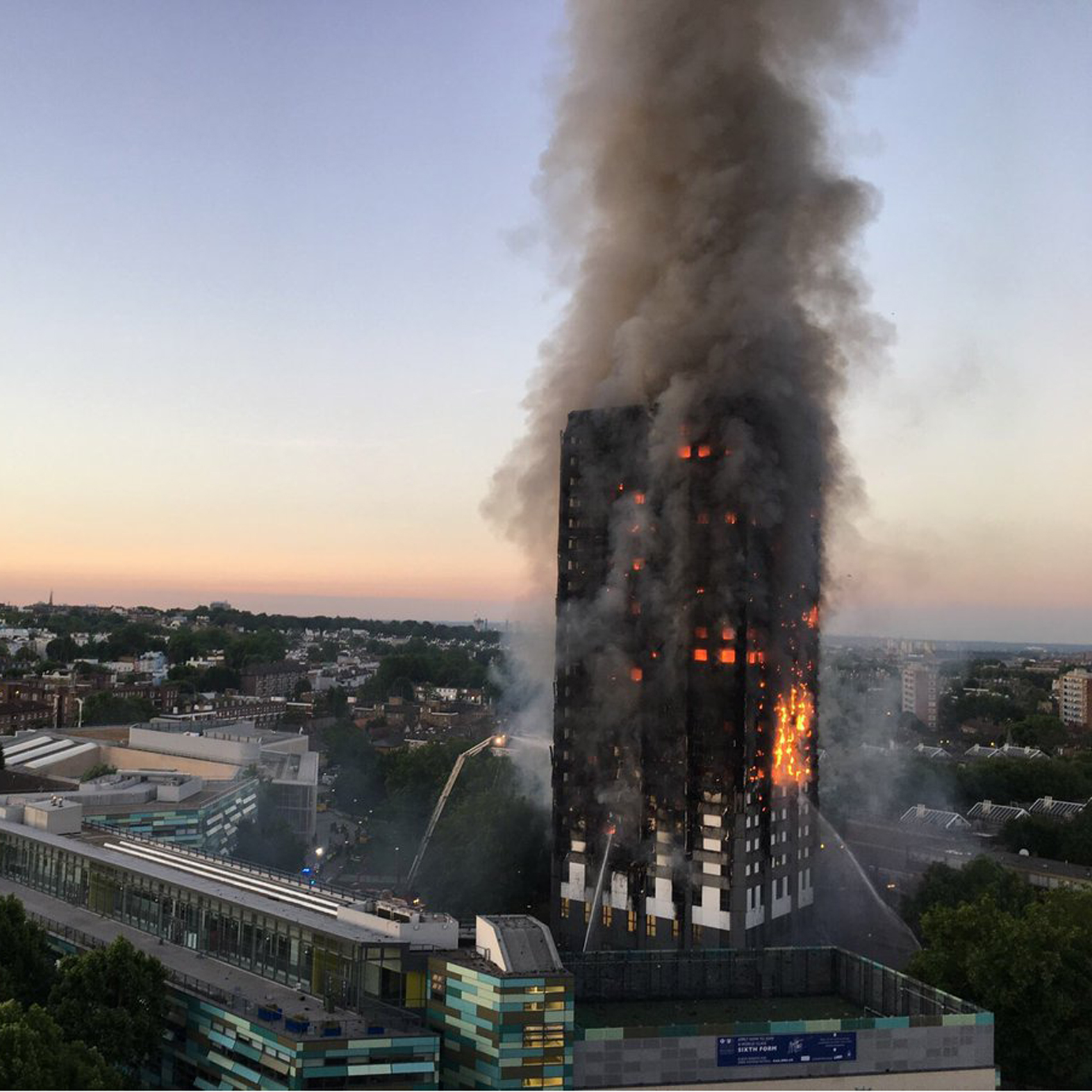 Theresa May orders public inquiry into Grenfell Tower fire as renovations blamed