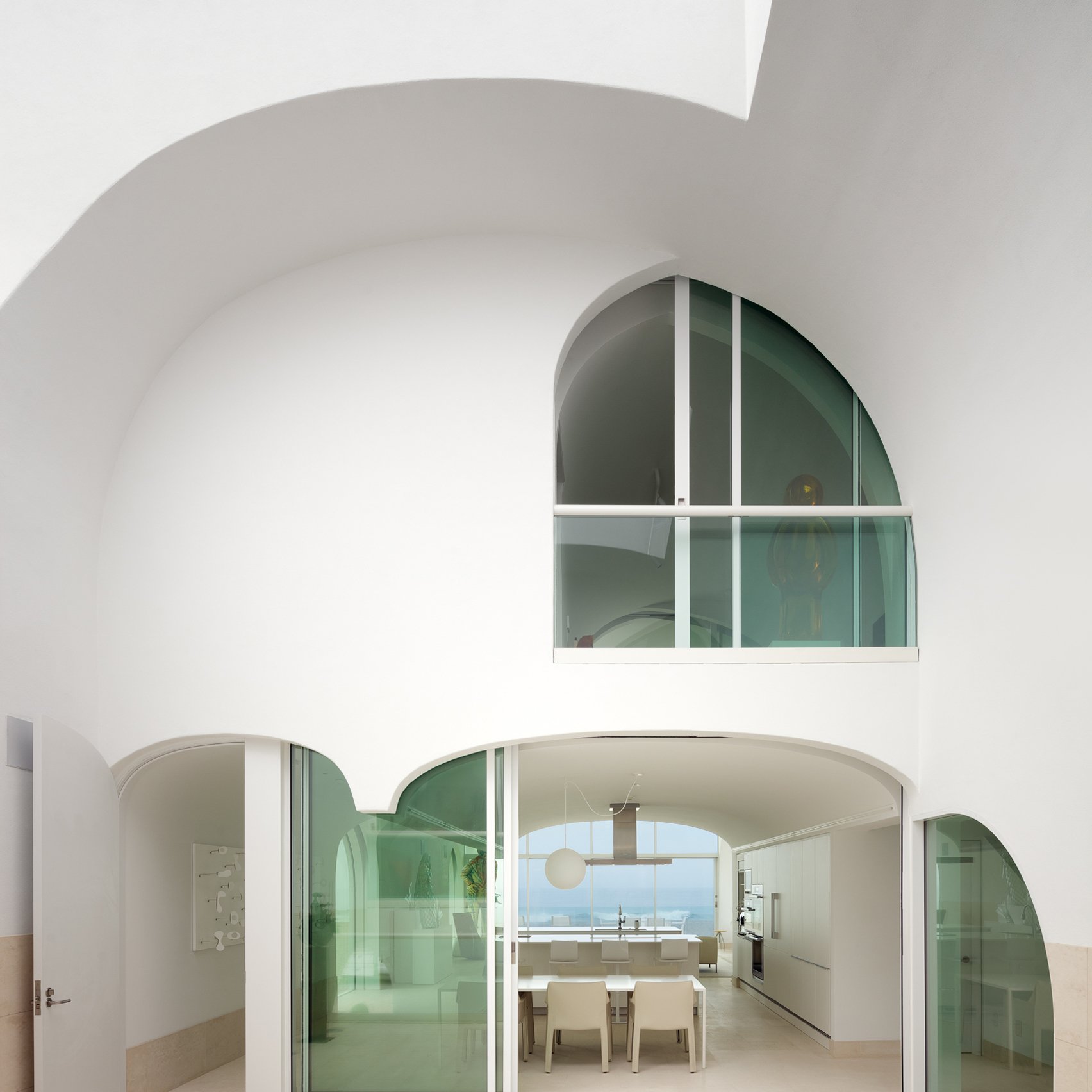 10 contemporary homes that integrate arched doorways, windows and nooks