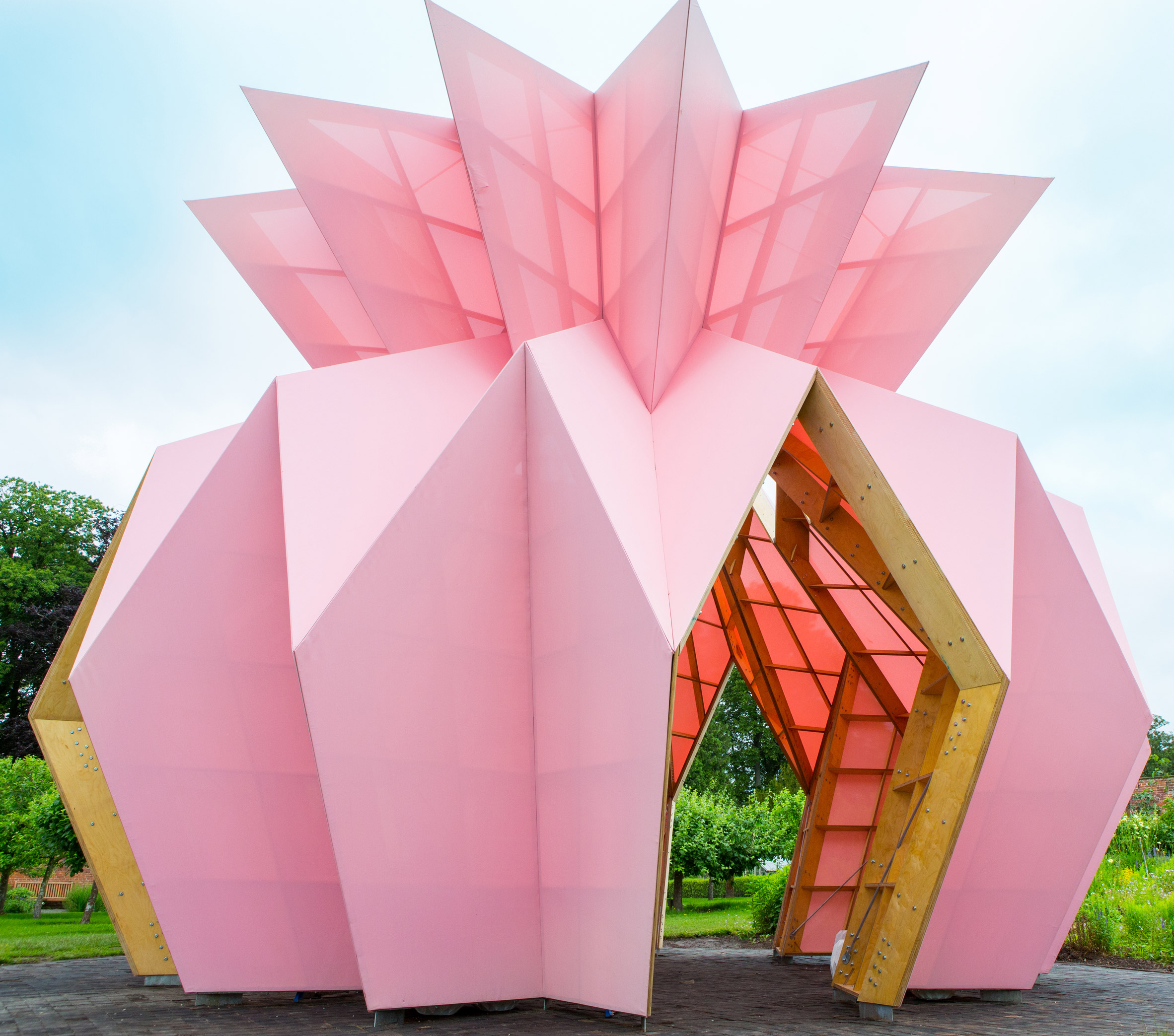 Studio Morison construct origami-like pink pavilion at the National Trust estate, Berrington Hall