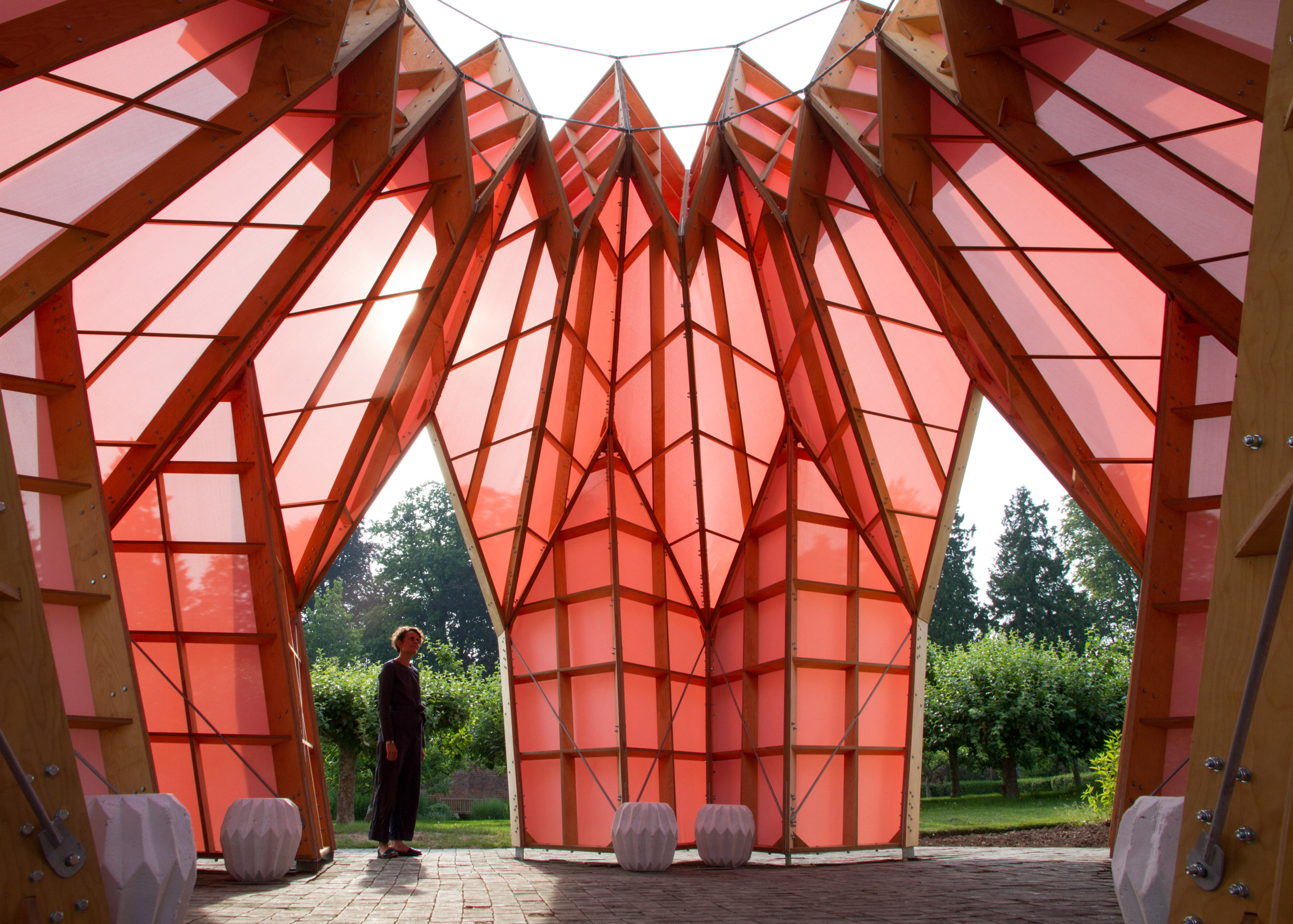 Studio Morison construct origami-like pink pavilion at the National Trust estate, Berrington Hall