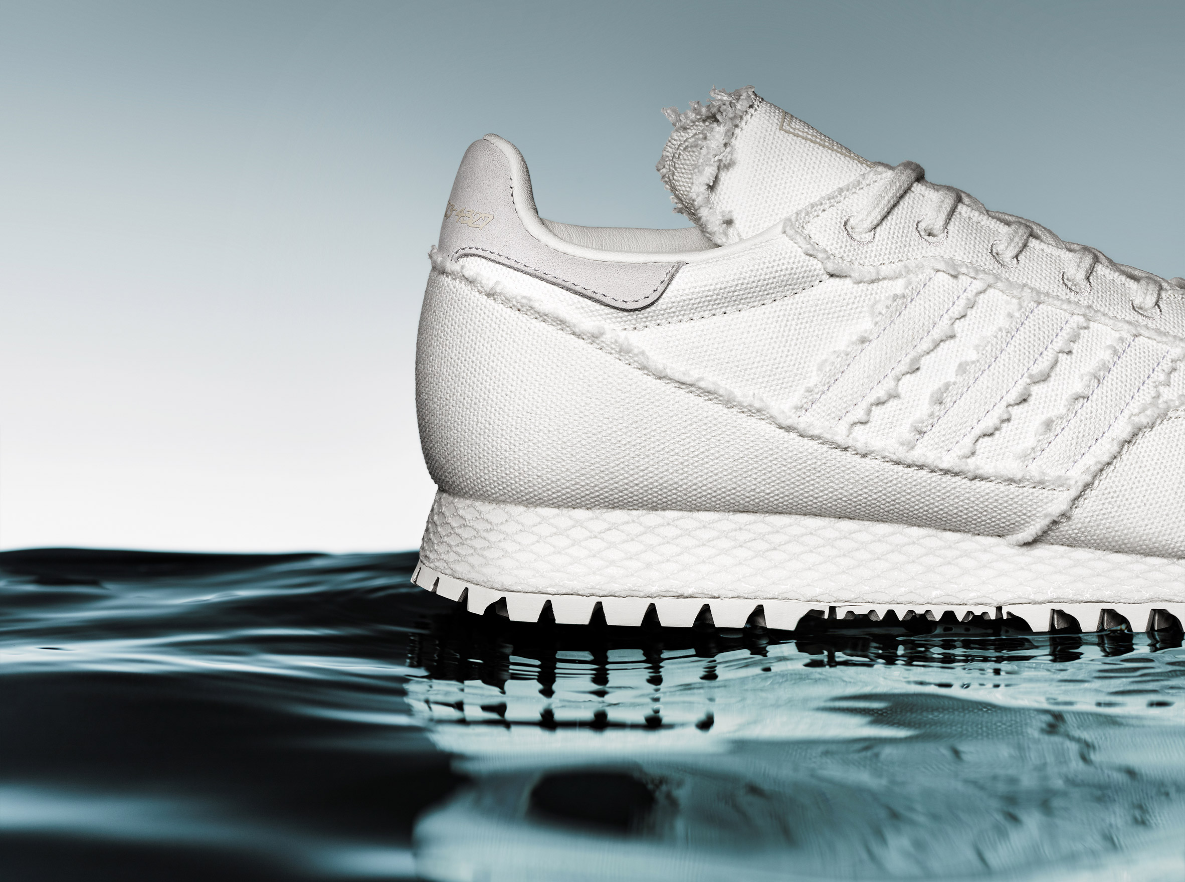 Daniel Arsham bases all-white Adidas trainers archaeological