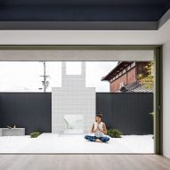Japanese house by Kouichi Kimura includes white-tiled courtyard for yoga