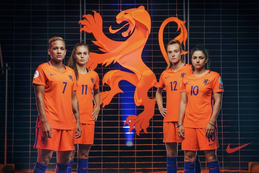 soccer team with orange jersey
