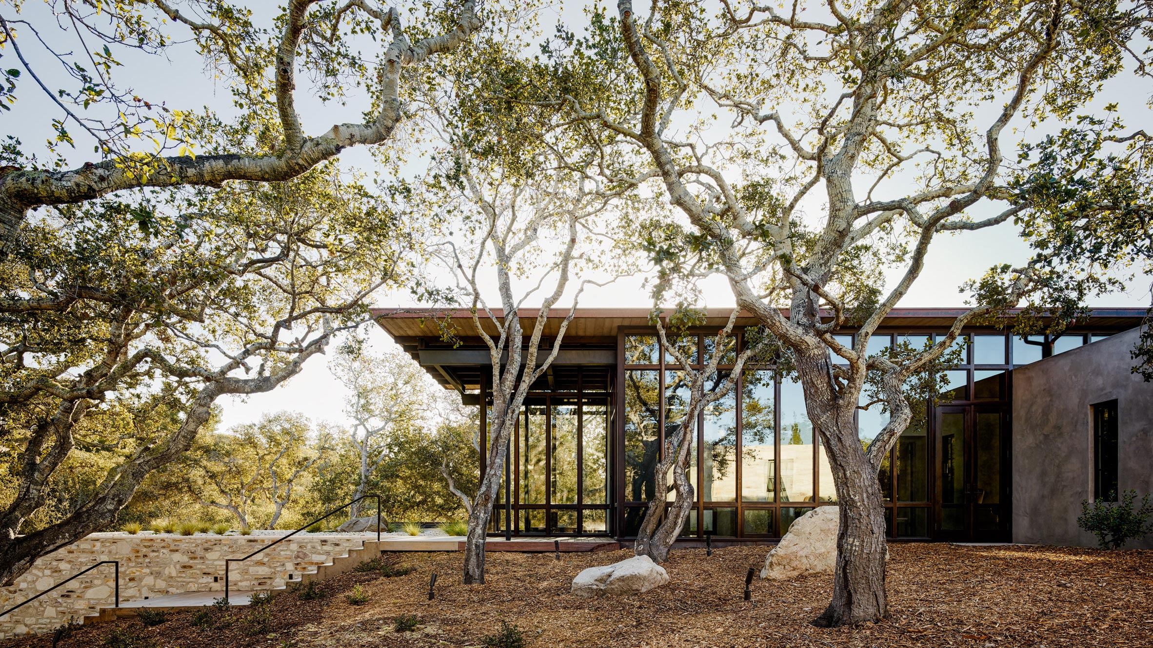 Studio Schicketanz creates California home with textured stone walls