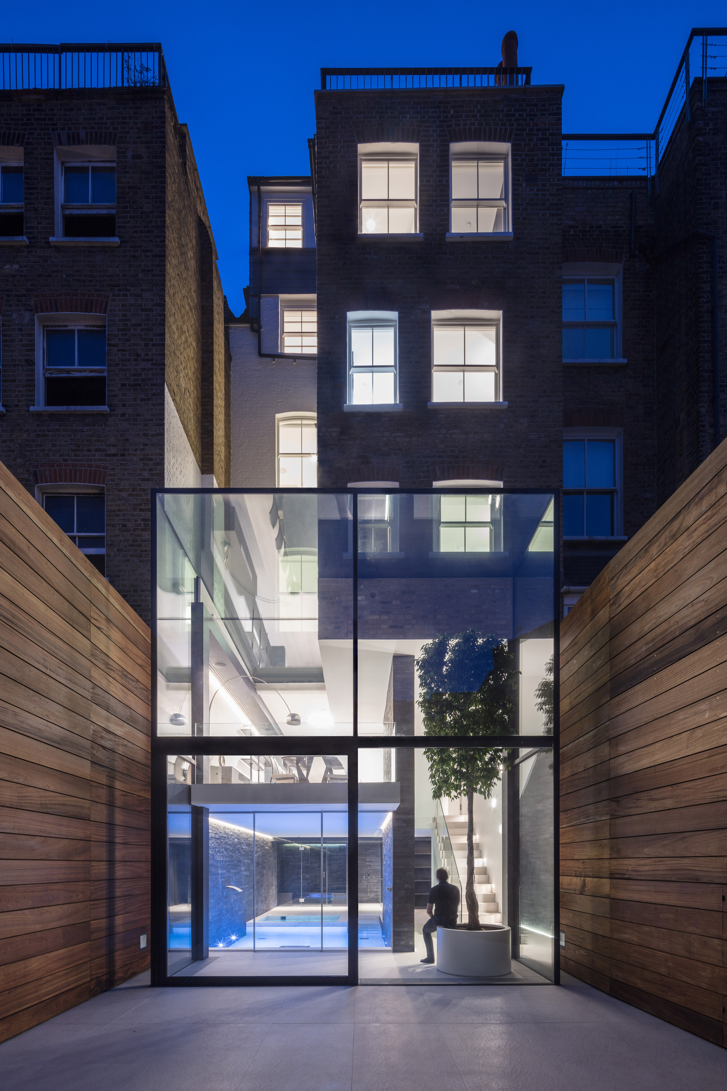 Glass Box Defines Extension With Basement Pool To Victorian Home In South London