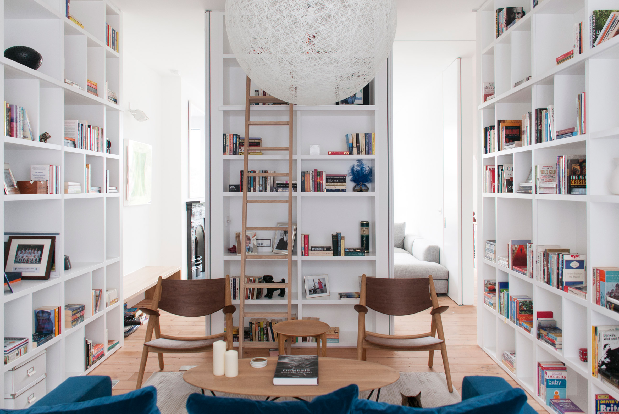 Shelving units and concealed doors compartmentalise refurbished London home