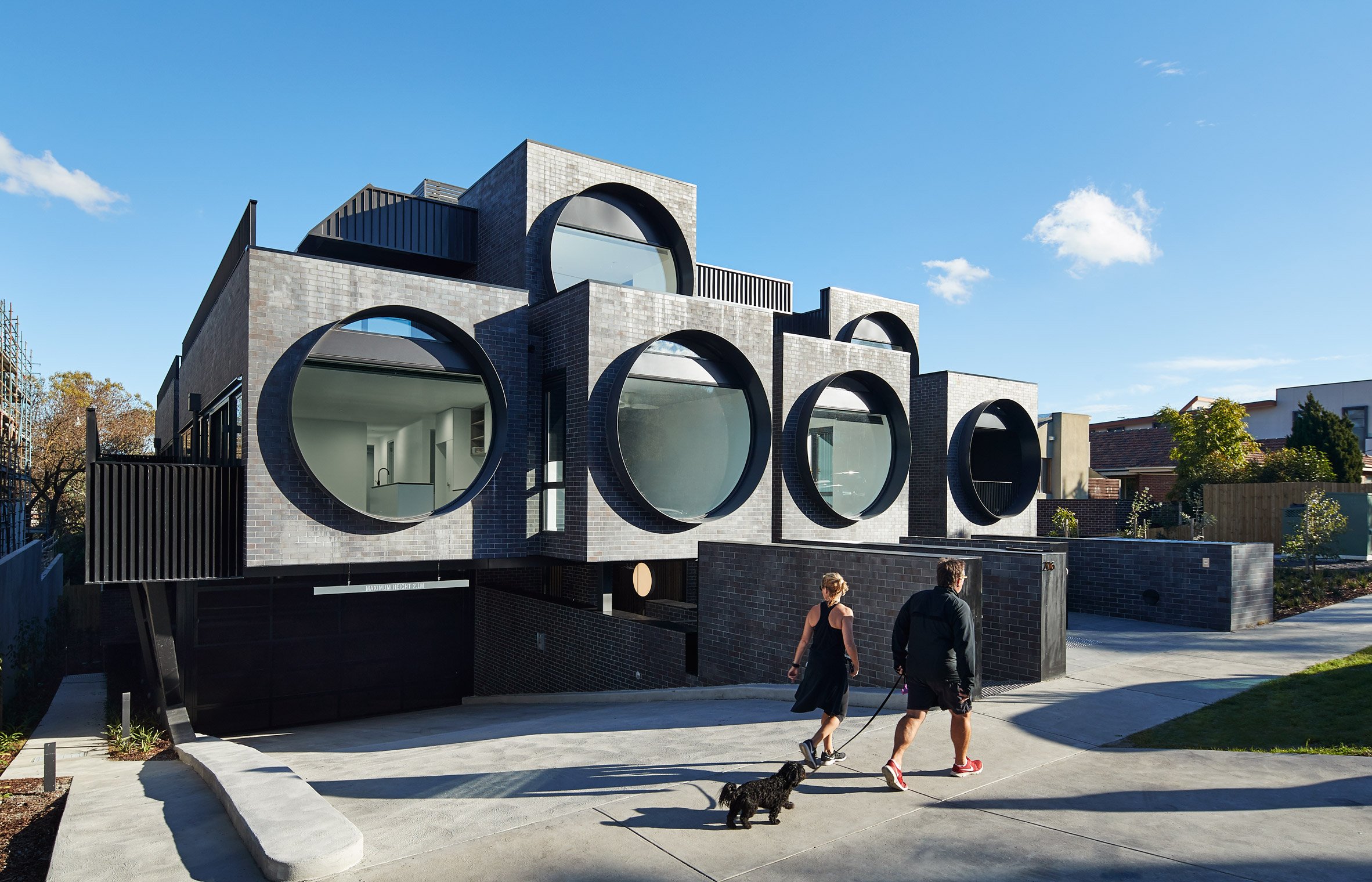 Huge porthole windows bathe Melbourne apartments with natural light