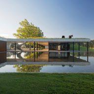 Polo stables by Estudio Ramos features grassy roof for horses to graze
