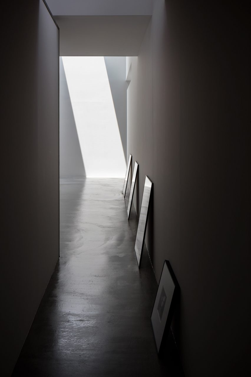 Hallway of corrugated steel house and studio by Japanese studio Form designed by Kouichi Kimura.