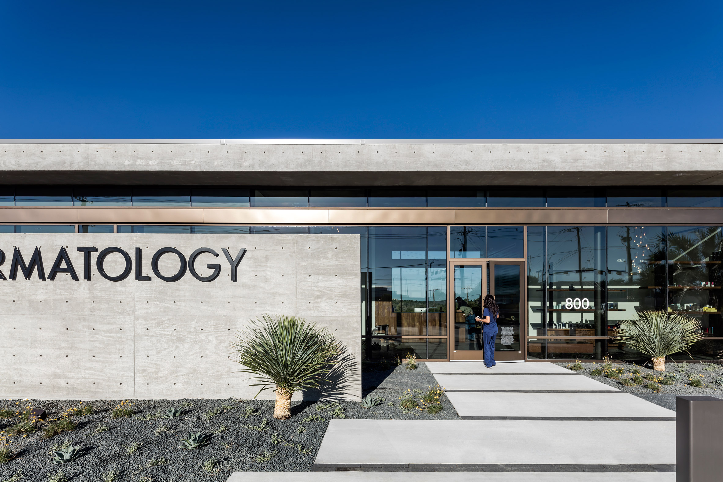 Concrete dermatology office by Matt Fajkus overlooks Texas Hill Country
