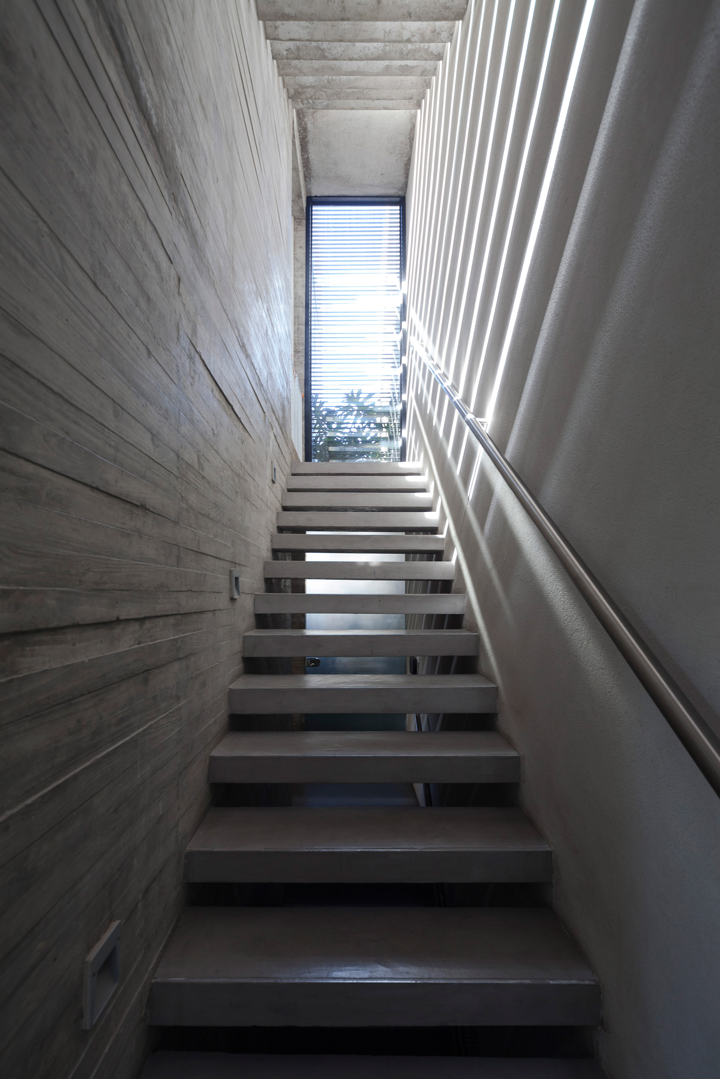 Architecture firm Dieguez Fridman designs concrete Corner House in Buenos Aires