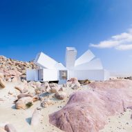Latest Dezeen Mail includes a proposed home made up of angled shipping containers