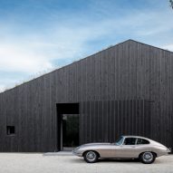 Dutch studio FillieVerhoeven Architects has completed a house near Rotterdam featuring an asymmetric gabled form clad entirely in blackened timber.