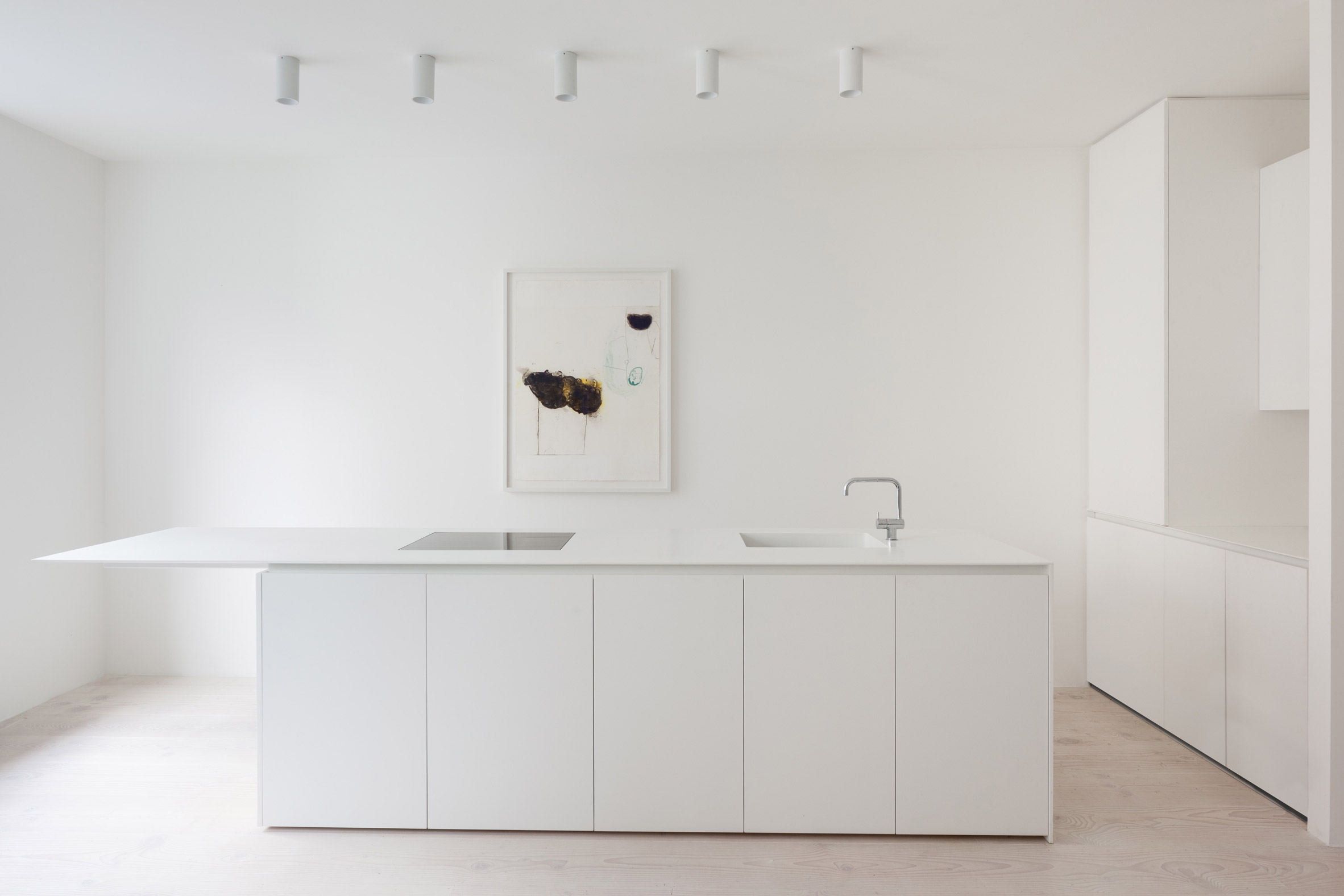 HASA Architects transforms London apartment into "seamless white box"