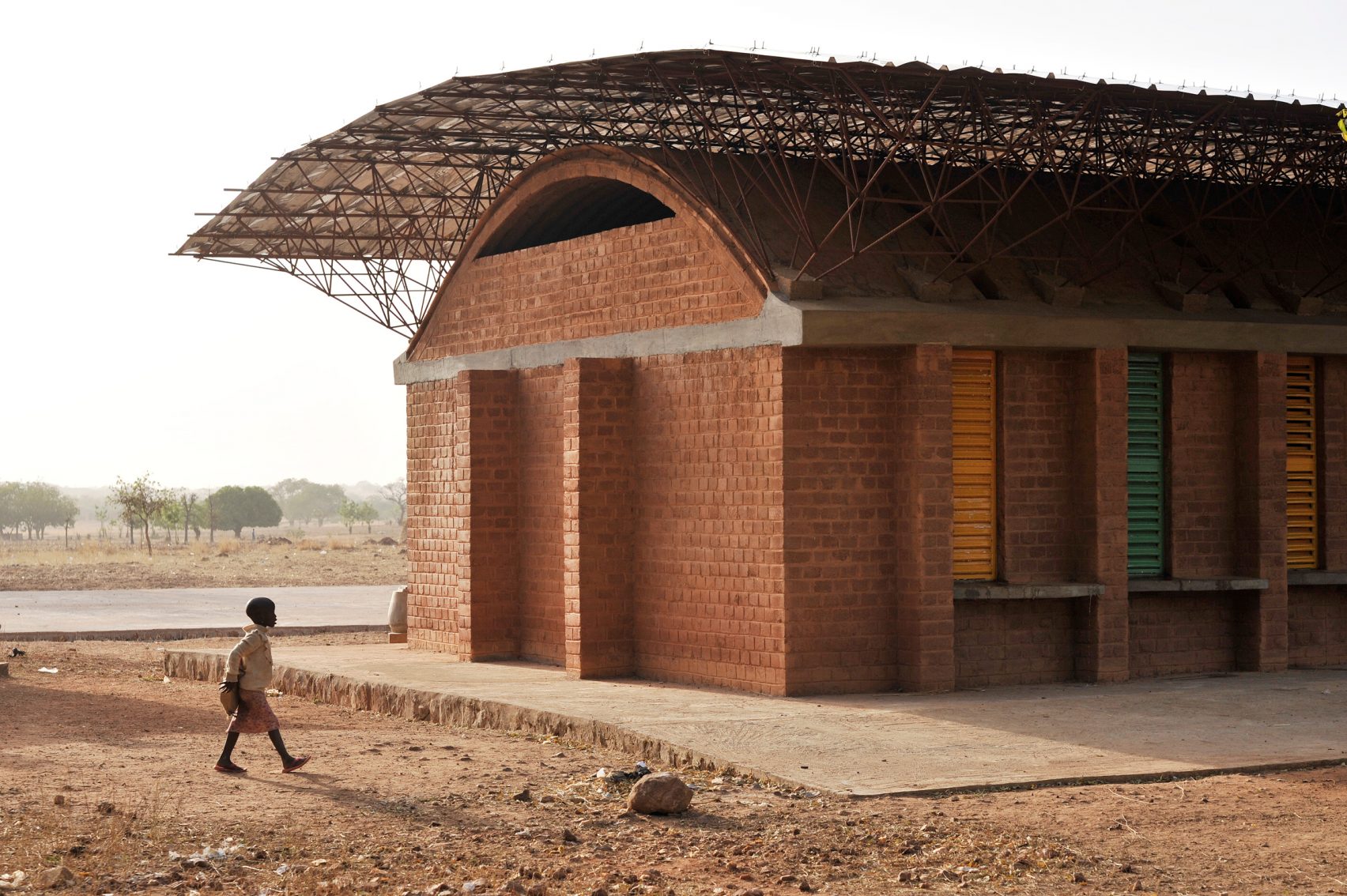 Diébédo Francis Kéré describes village school that launched his career