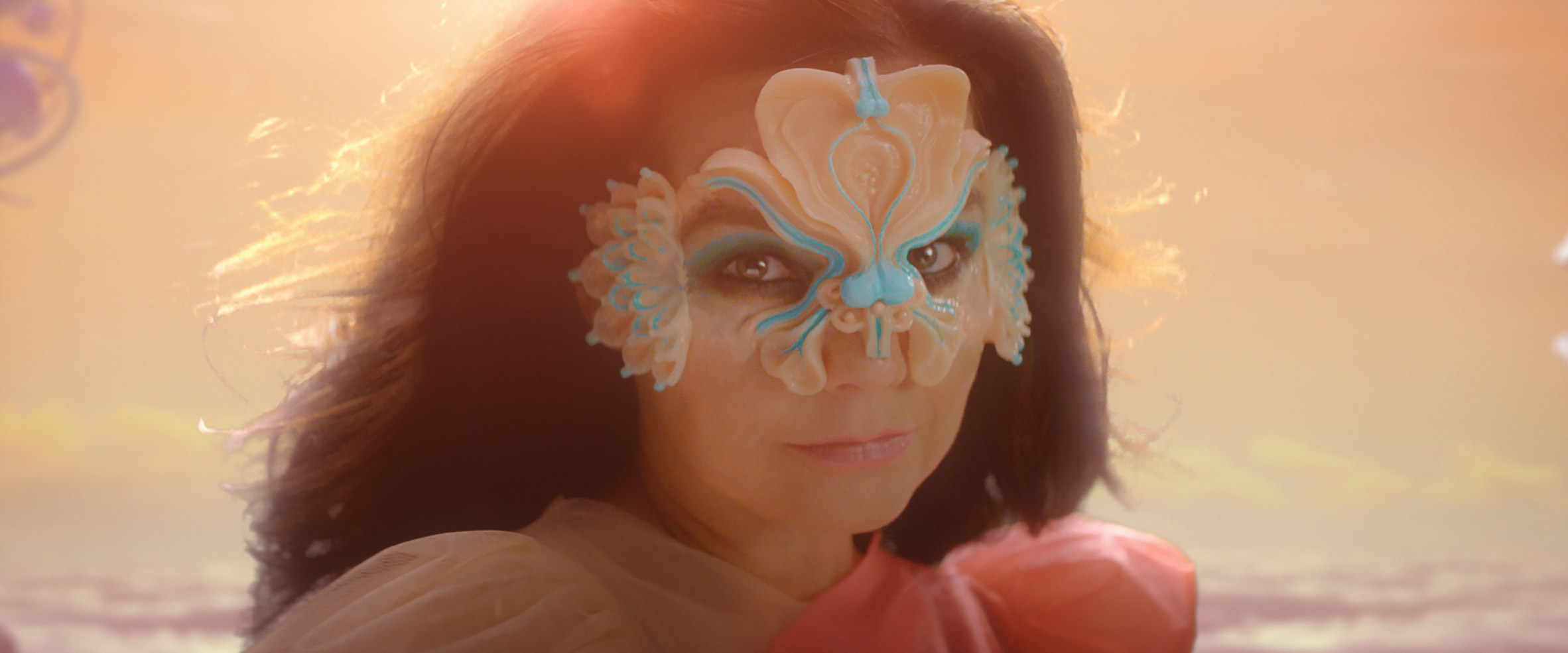 Prismatic visuals and floating beings feature in Björk's music video for The Gate