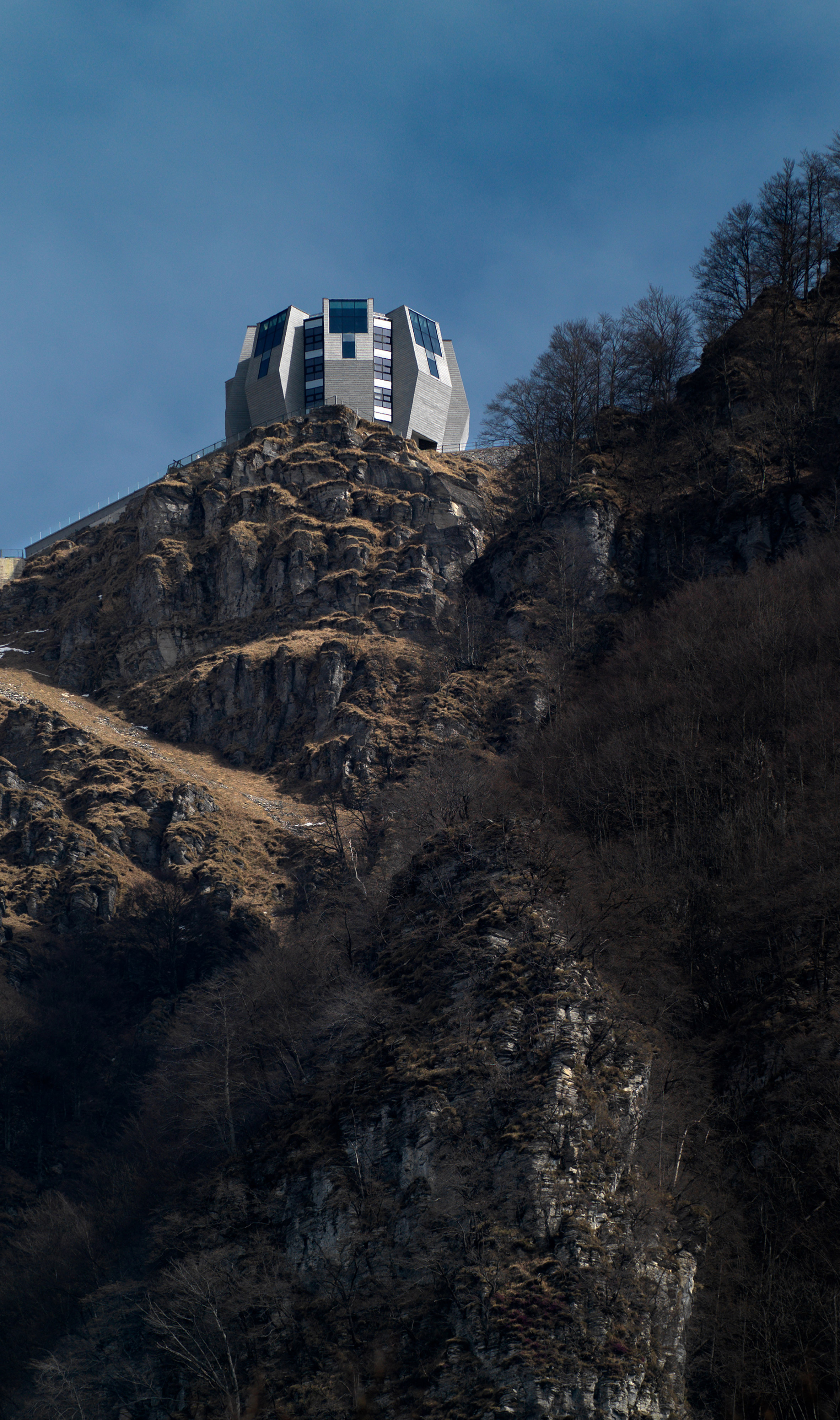 Mario Botta pairs stone with Jansen steel frames to create striped facade for Swiss mountain restaurant