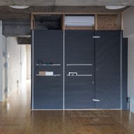 Renovated apartment in Tokyo has storage pockets sewn into its walls