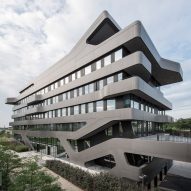 Jürgen Mayer H's FOM Hochschule building features bulging balconies and seamless stairs