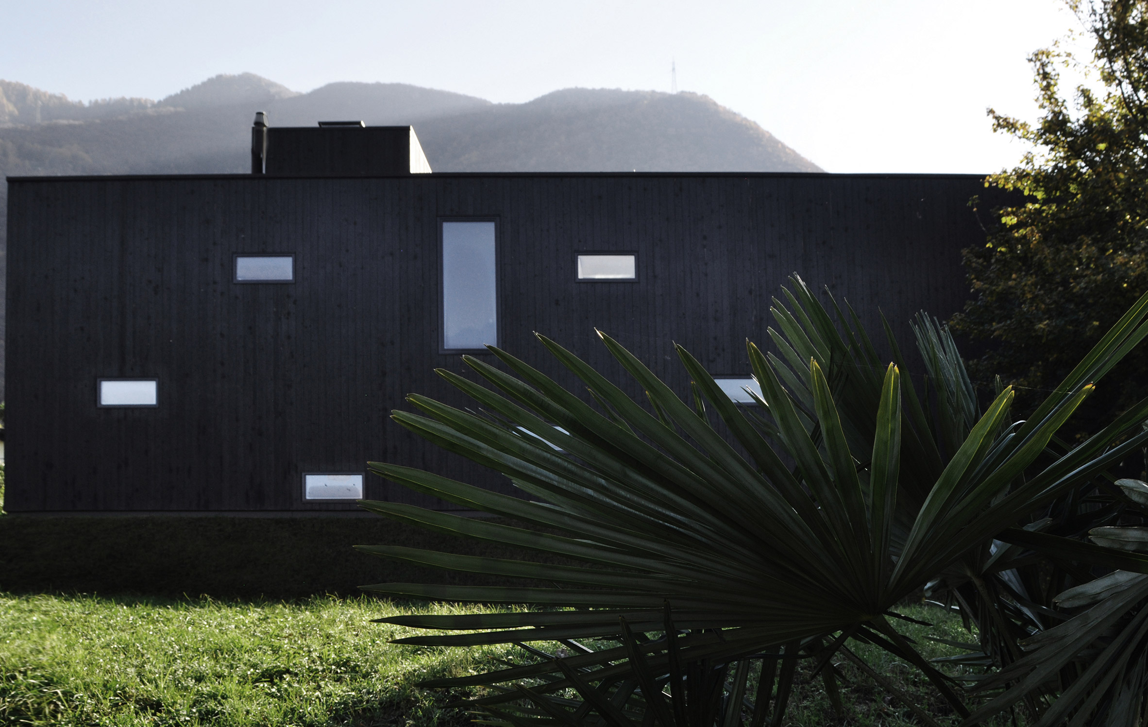 THEWOODBUILDING is a prefabricated wooden holiday home clad in charred timber boards by designers Nicole Lachelle and Christian Niessen