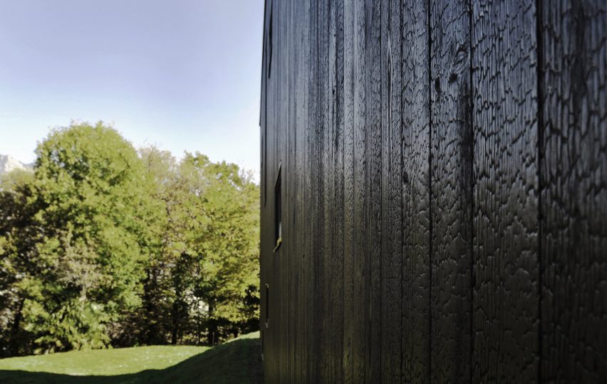 THEWOODBUILDING is a prefabricated wooden holiday home clad in charred timber boards by designers Nicole Lachelle and Christian Niessen