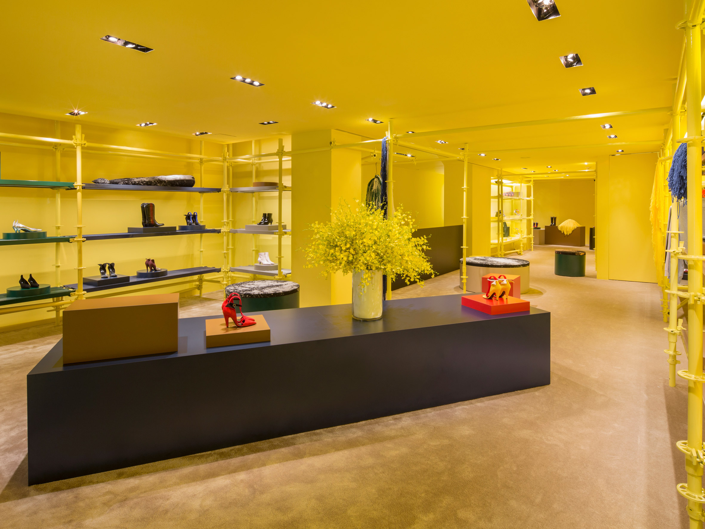 Raf Simons and Sterling Ruby adds yellow scaffolding to Calvin Klein store