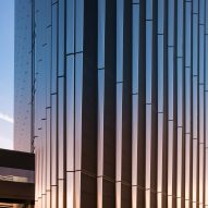Benthem Crouwel adds stripy tower surrounded by a moat to Amsterdam data centre