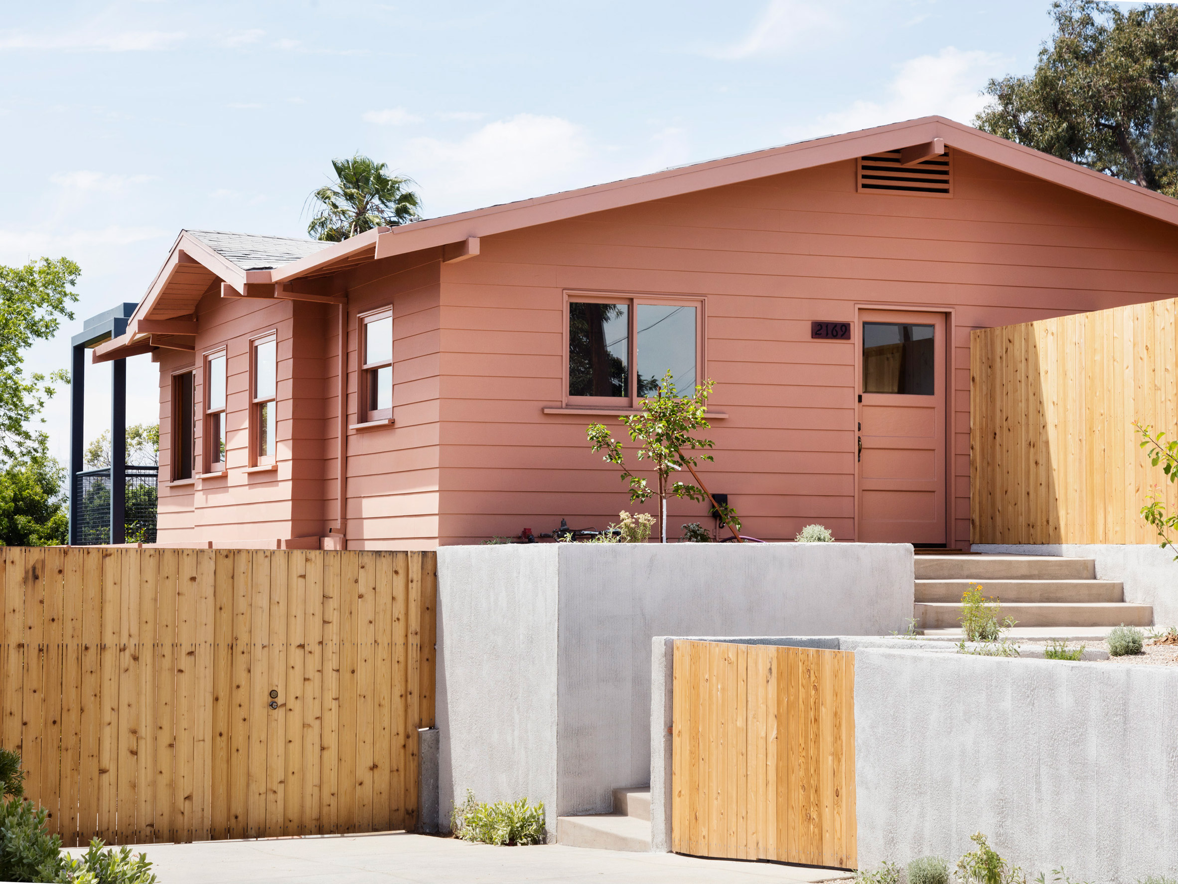 Productora adds steel-frame extension to pink bungalow in Los Angeles