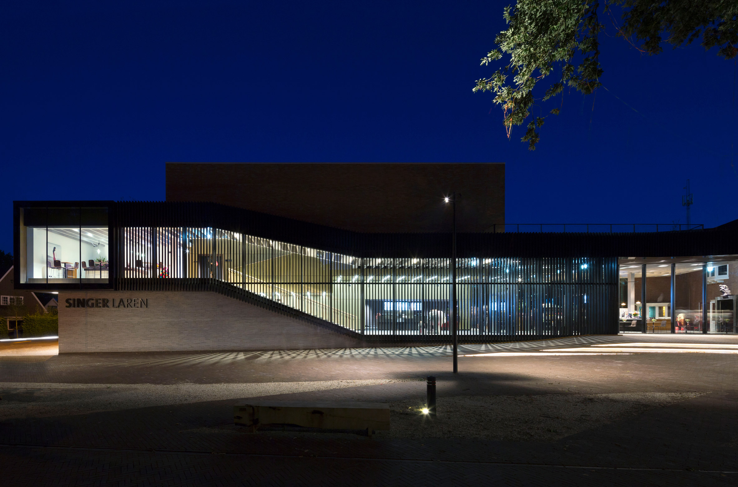 Amsterdam studio KRFT has updated and extended a museum and cultural complex in the Dutch town of Laren