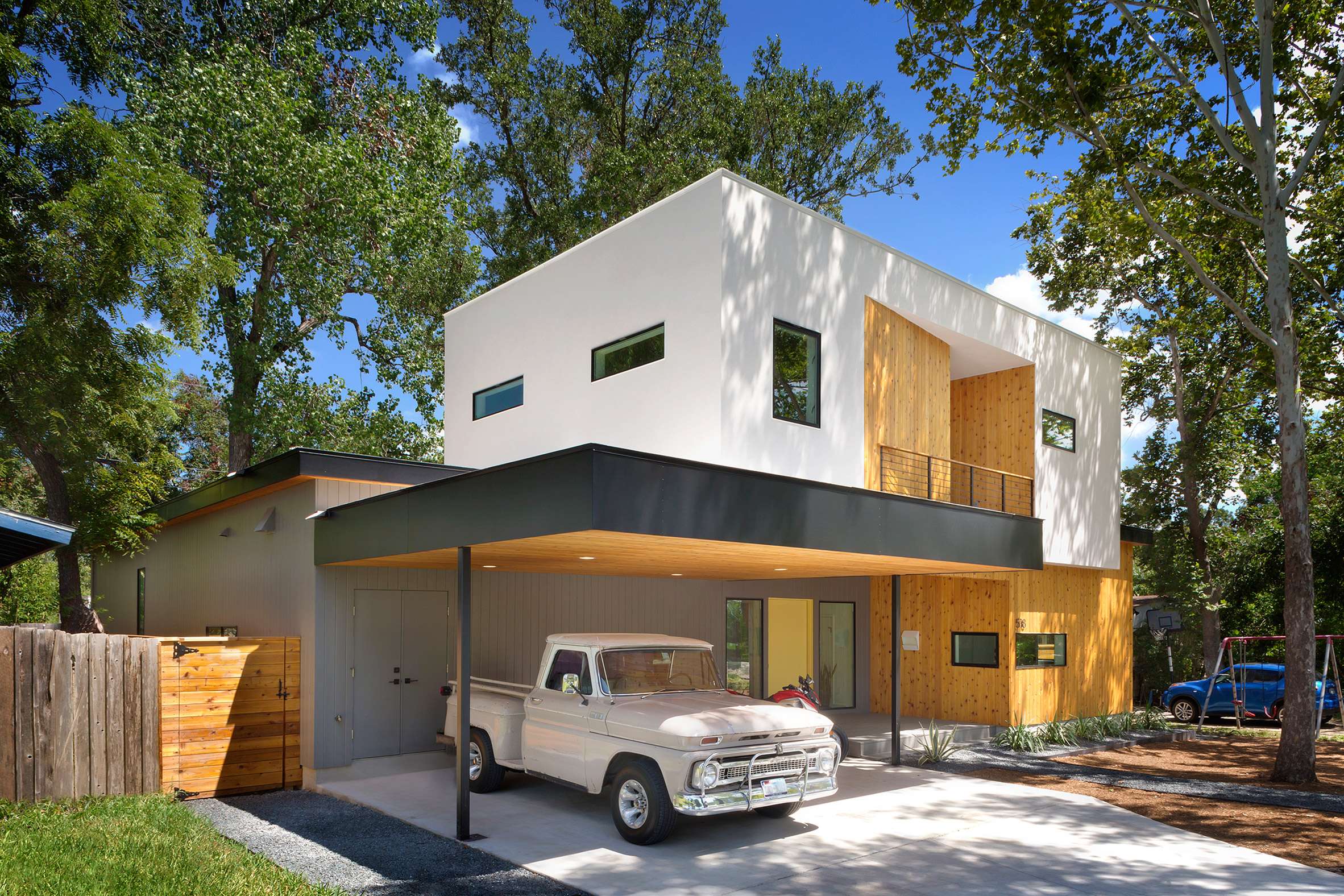 Matt Fajkus Organises Austin Home Around Old Oak Tree Architecture