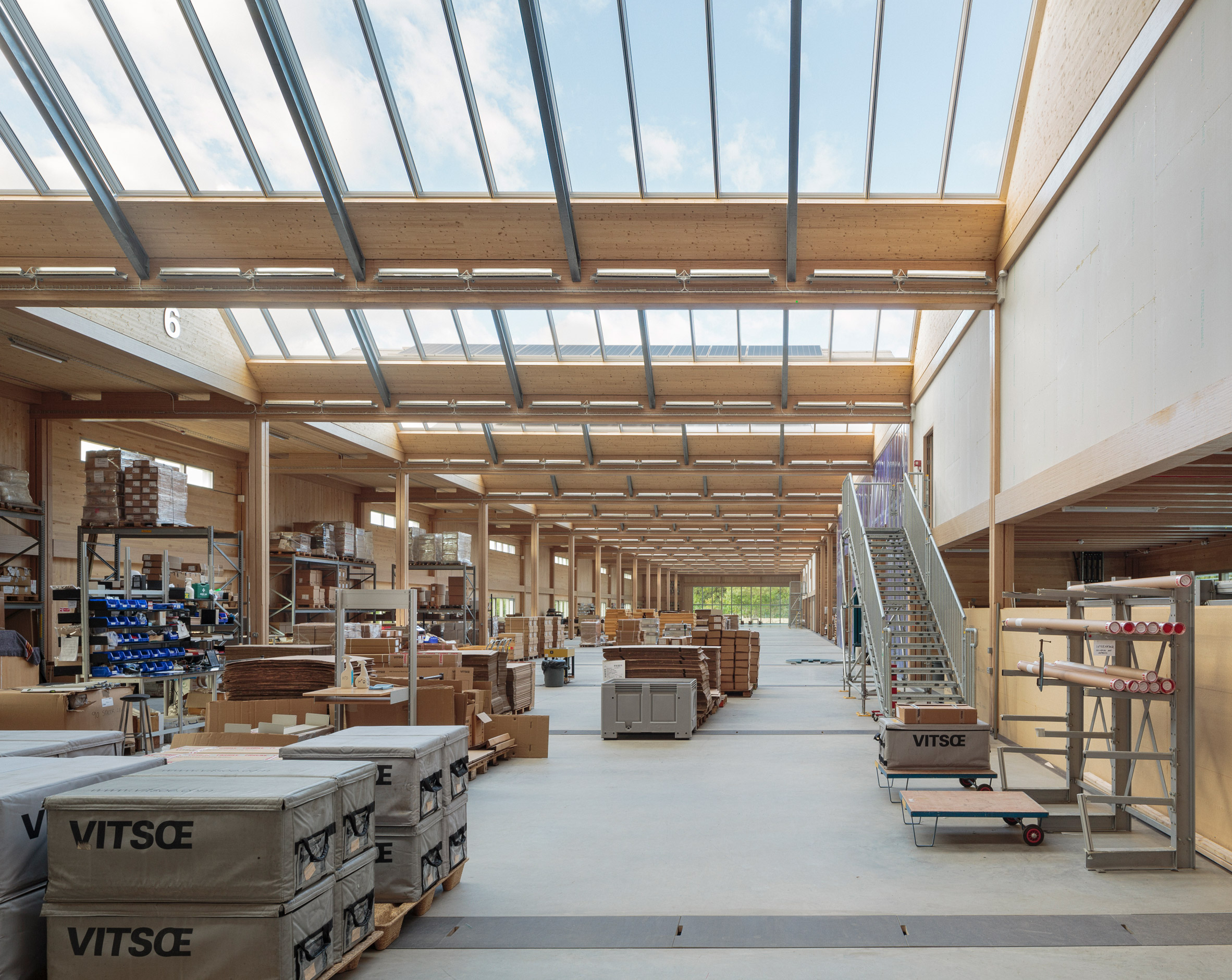 British furniture brand Vitsœ has opened a new headquarters and production facility in the English town of Royal Leamington Spa, featuring a saw-toothed roof and modular construction that means it can be easily updated.