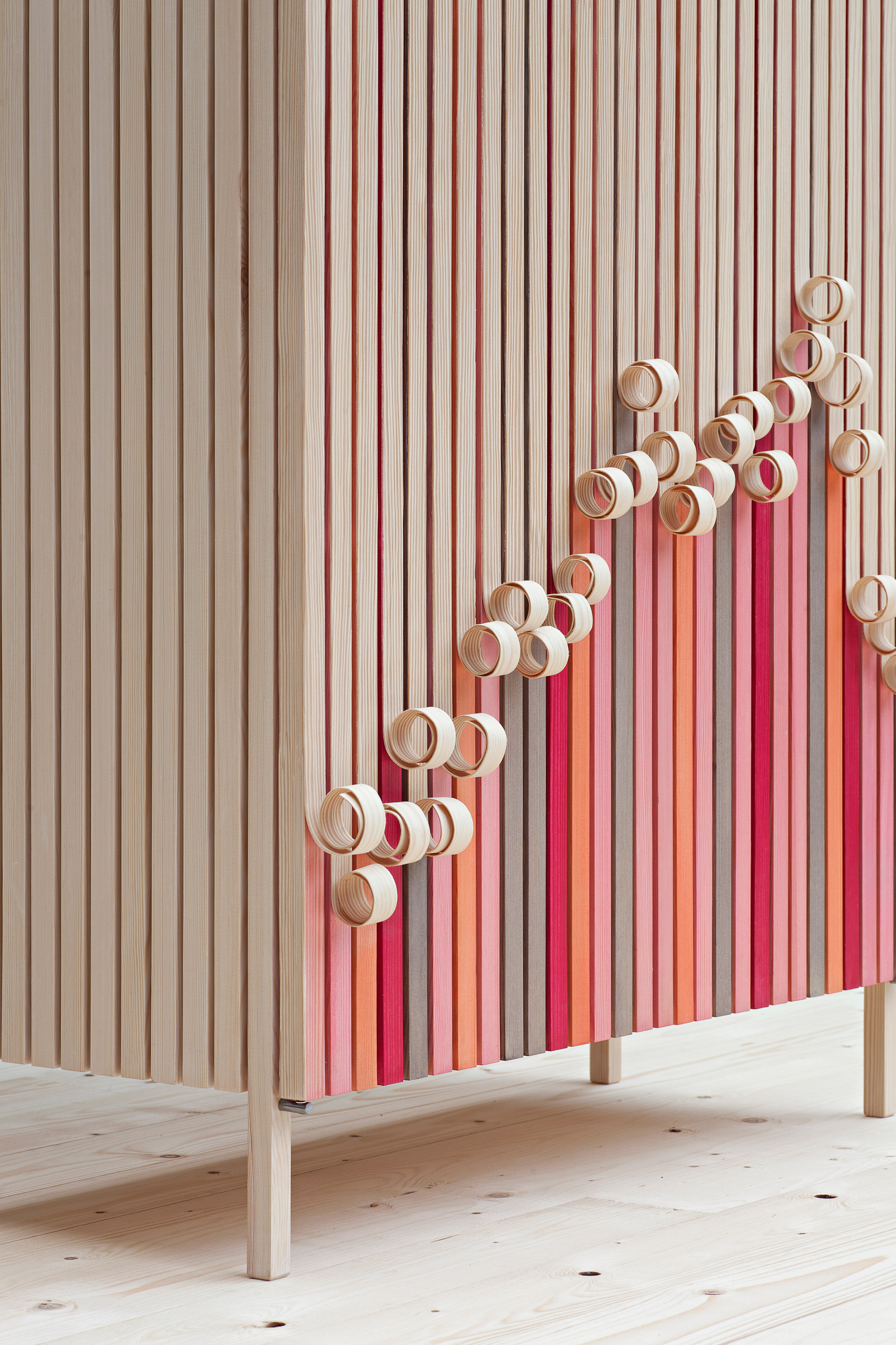 Stoft studio's Whittle Away cabinets peel away over time to reveal colourful panels underneath
