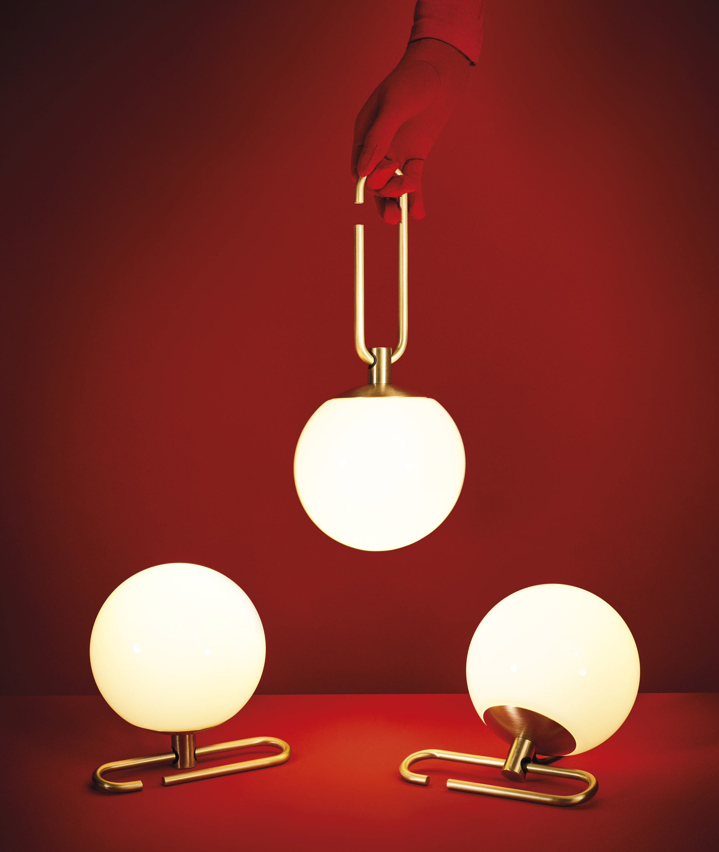 Neri&Hu's lantern-inspired lights sit on or hang from adjustable brass rings