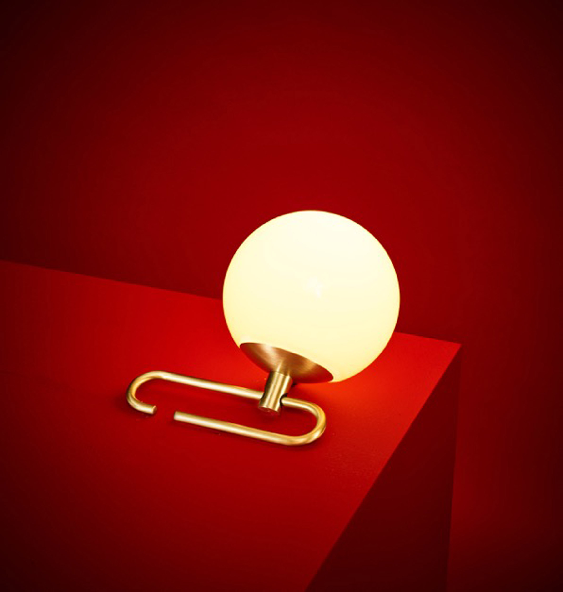Neri&Hu designs lantern-inspired lamps that hang from adjustable brass rings